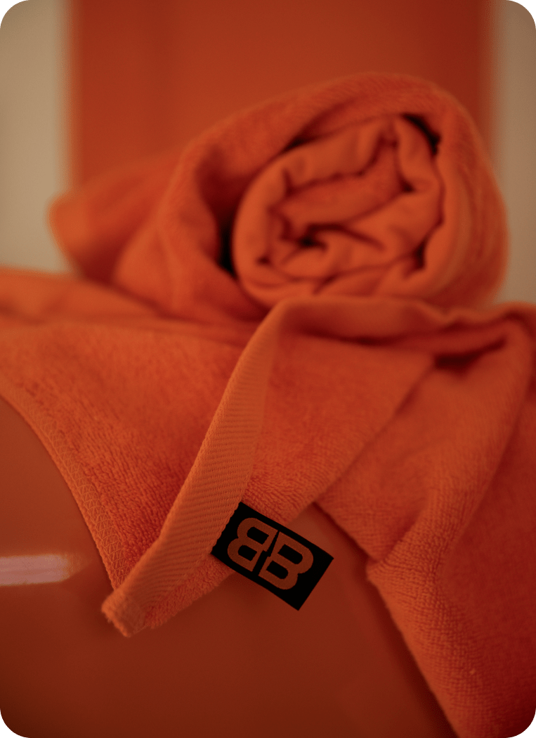 Orange towels with bootcamp logo